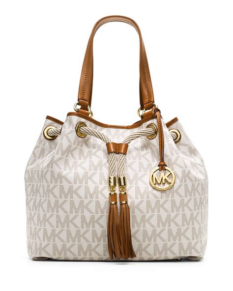 michael kors white and tan purse with lock|Michael Kors beige purse.